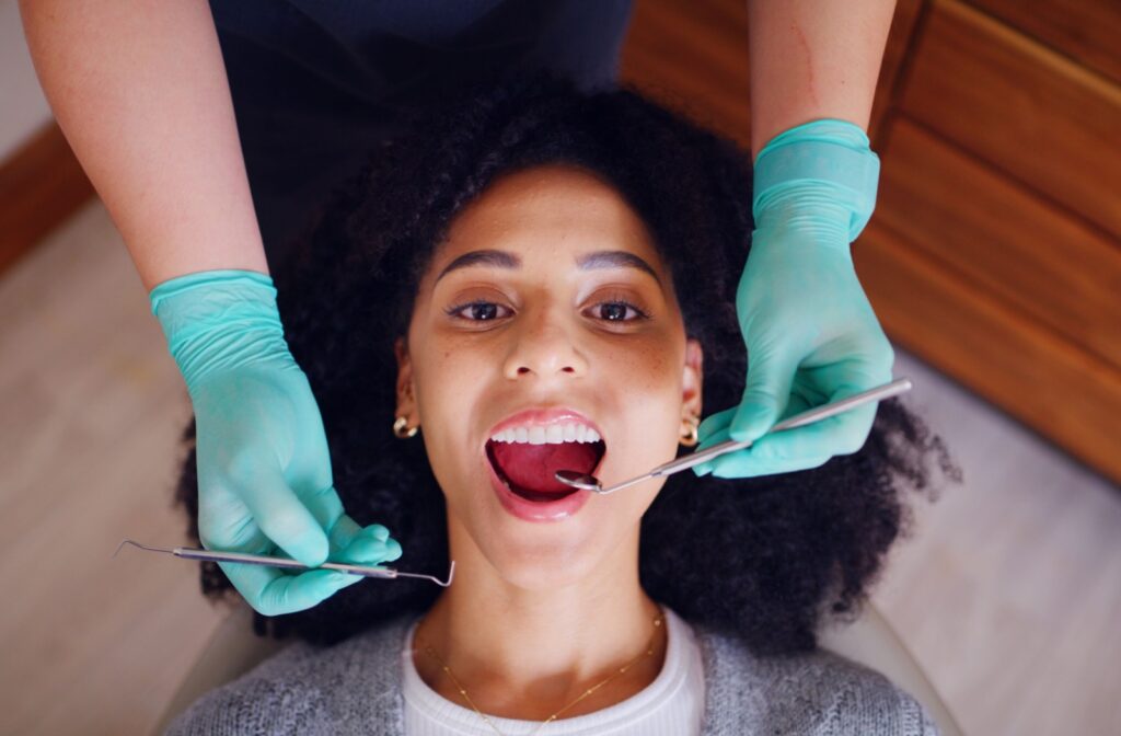 A person getting their teeth cleaned a routine dental appointment